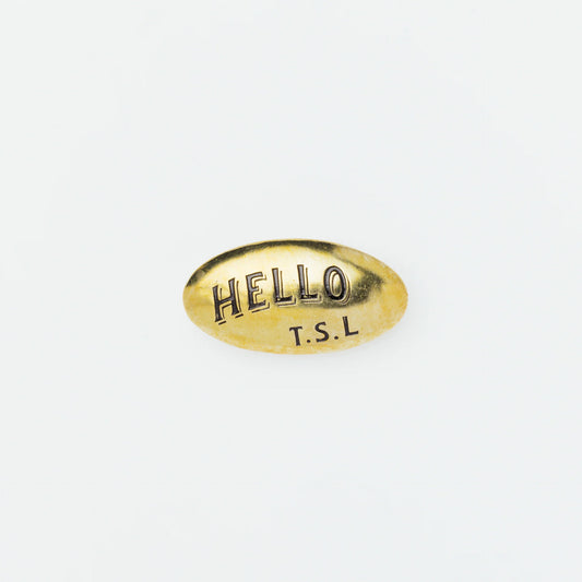 The Superior Labor Hello TSL Brass Oval Pin - C