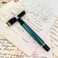 Pre-Owned Pelikan M600 Black & Green Fountain Pen 14K F