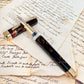Pre-Owned Visconti Opera Master Firestorm Fountain Pen 18K F