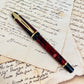 Pre-Owned Waterman Phileas Red/Black Marble Fountain Pen 18K M