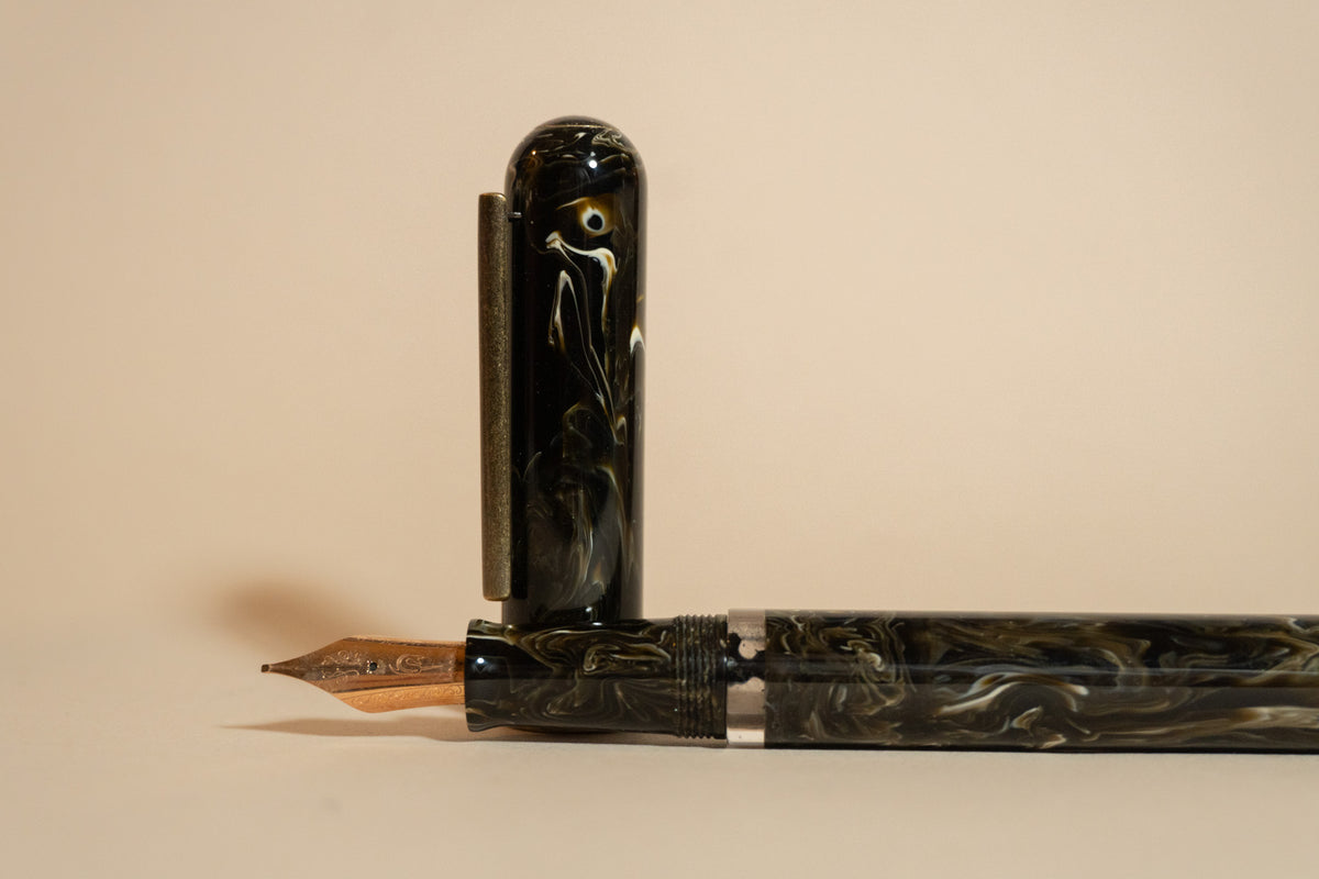 Pre-Owned Narwhal (Nahvalur) Goldspot Exclusive Primary Macchiato Fountain Pen - Fine