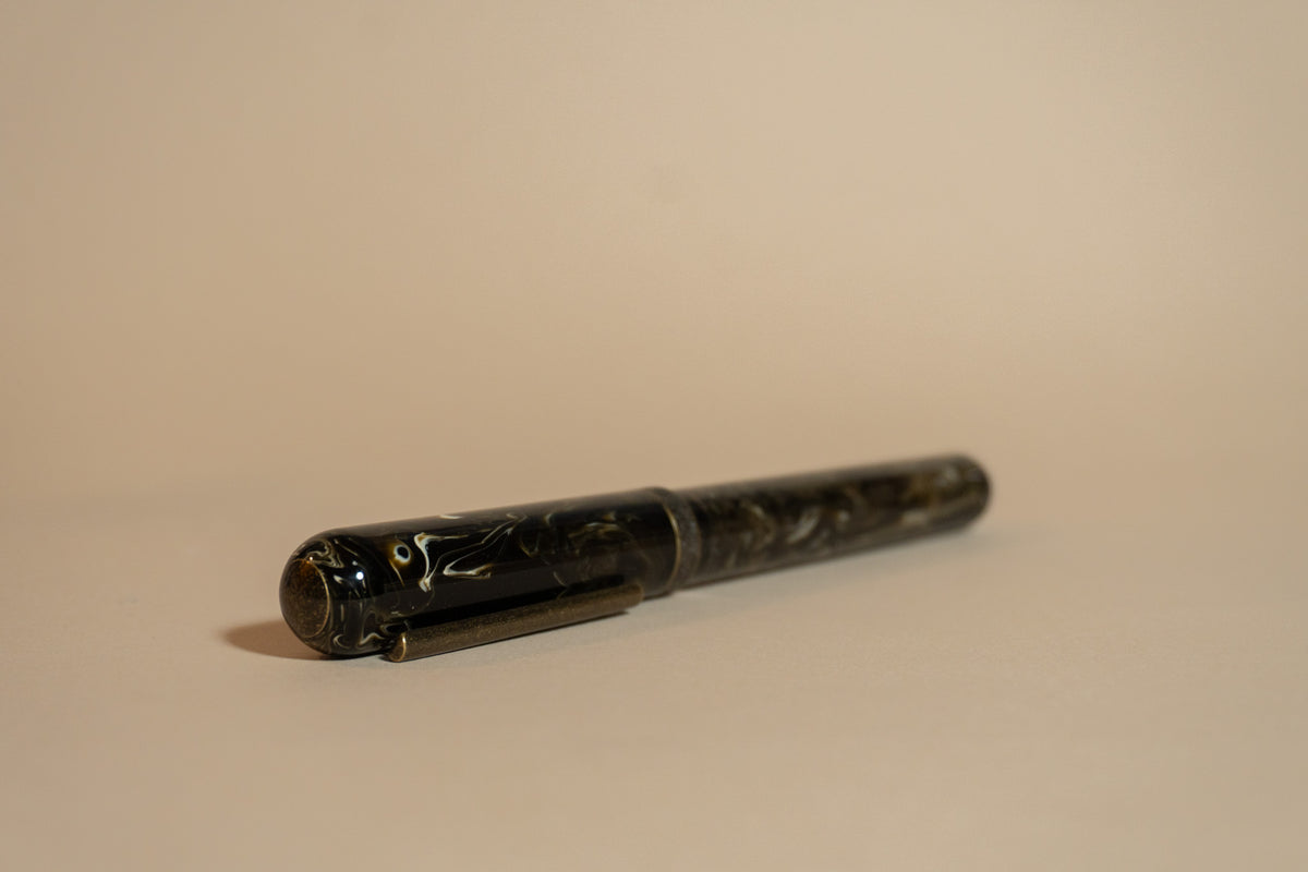 Pre-Owned Narwhal (Nahvalur) Goldspot Exclusive Primary Macchiato Fountain Pen - Fine